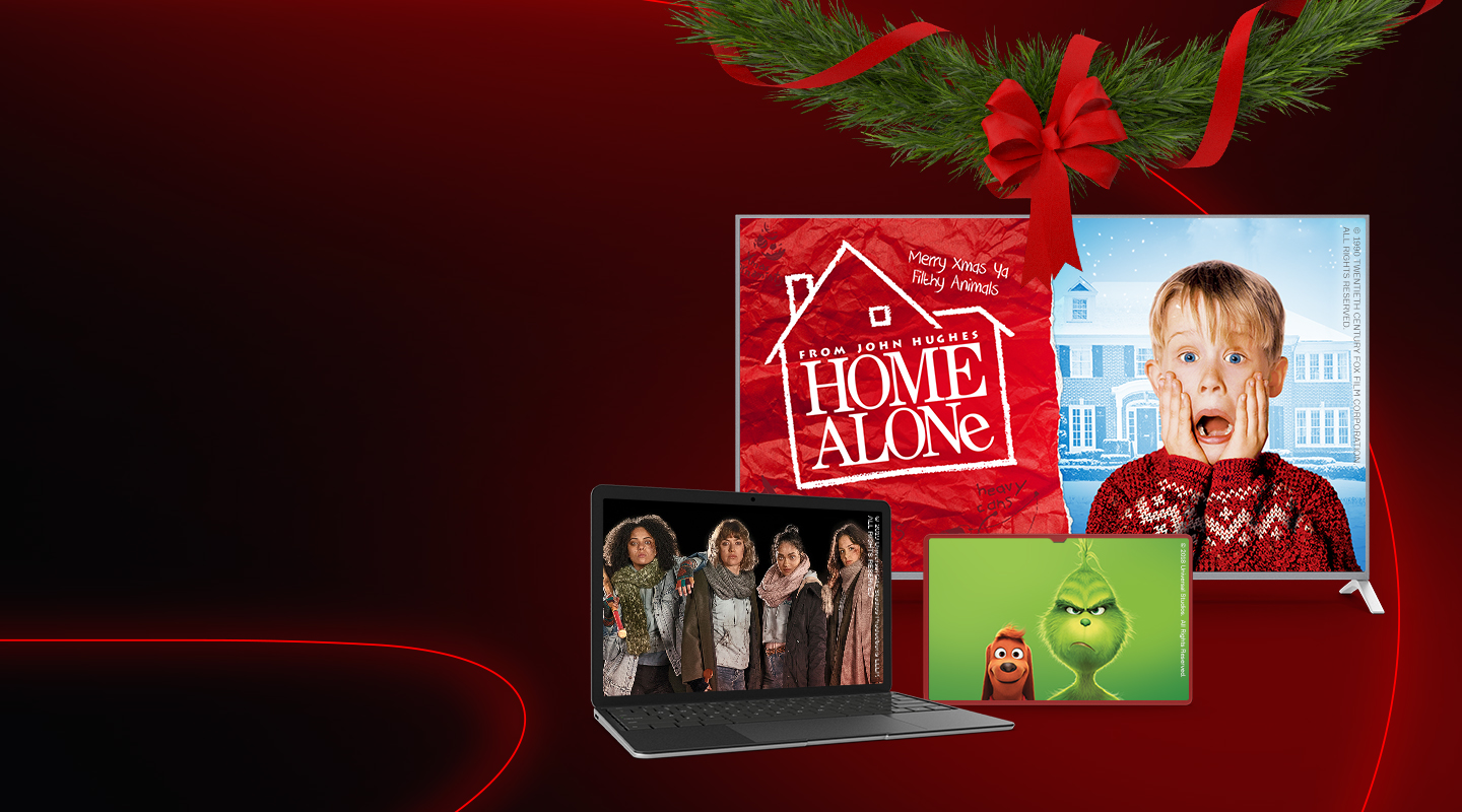 reddish background with laptop and Christmas movies