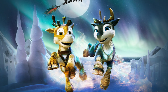 два северных оленя на снегу