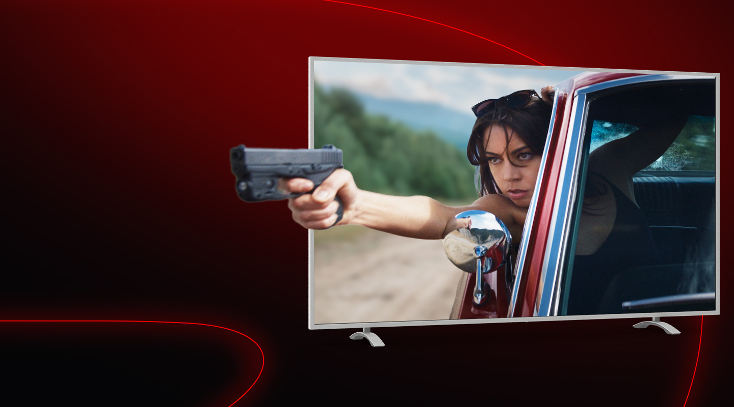 woman from a car pointing a gun