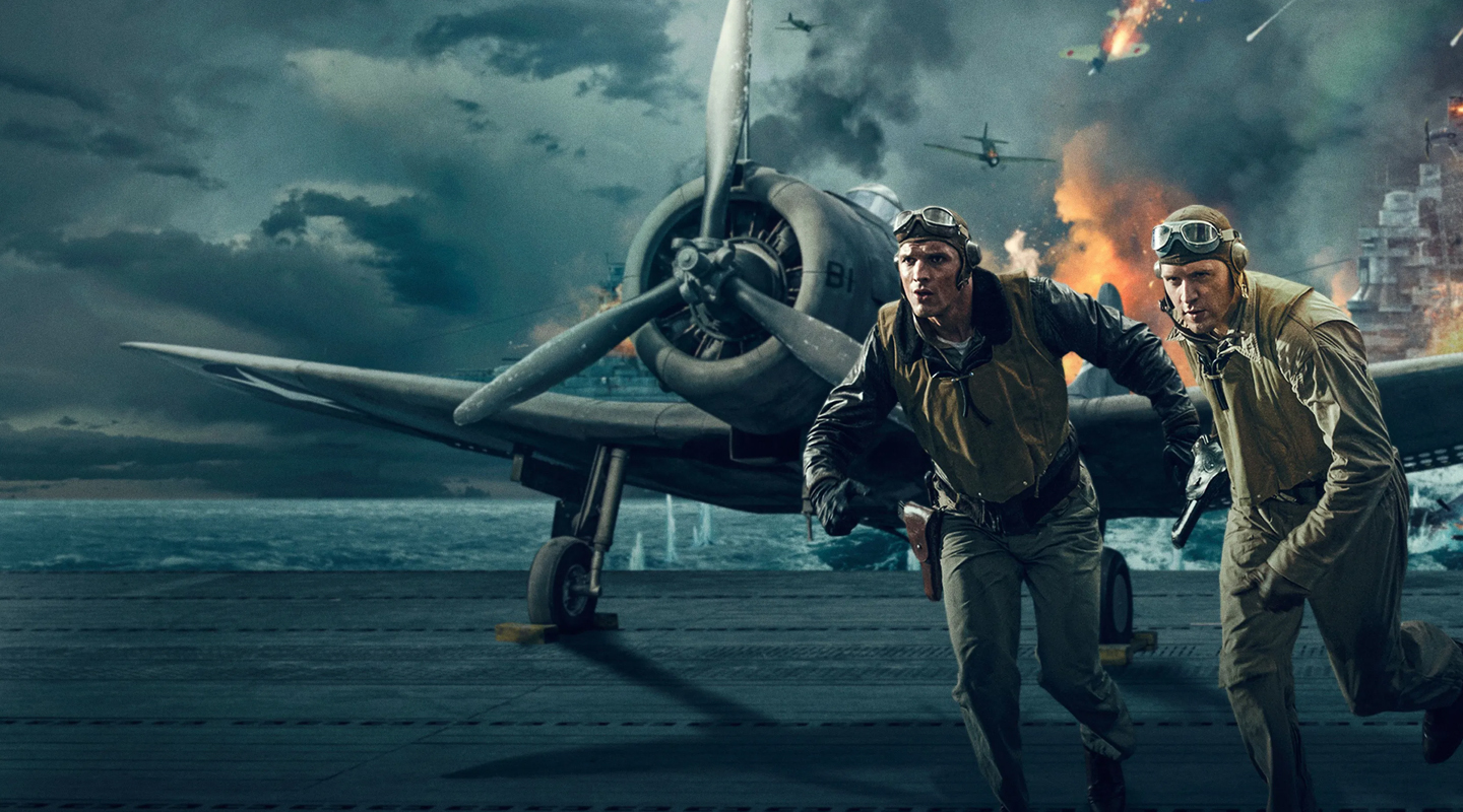 men running from a burning plane